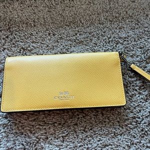 Yellow coach wristlet/wallet